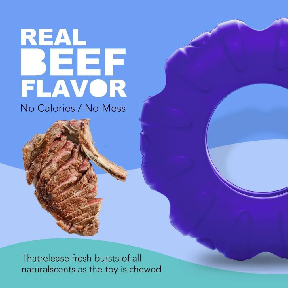 Blue tyre-shaped dog chew toy with oval openings for food dispensing