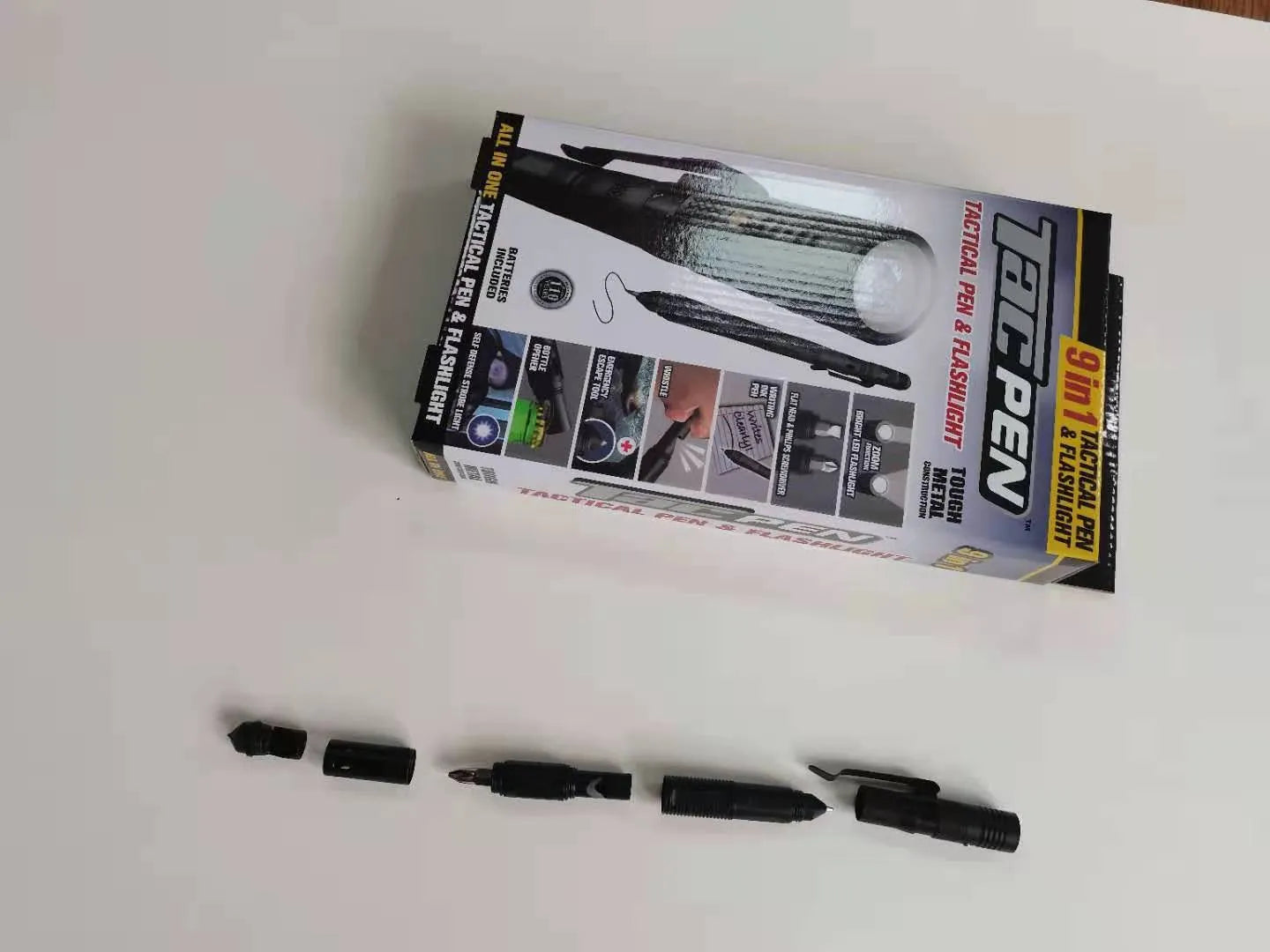 Black nine-in-one multi-function flashlight car window breaker survival pen