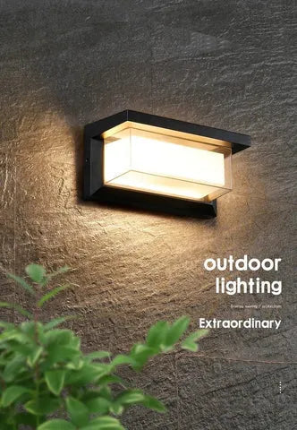 Outdoor wall mounted lamp with acrylic shade and aluminium body, suitable for garden and exterior lighting with IP65 waterproof rating.
