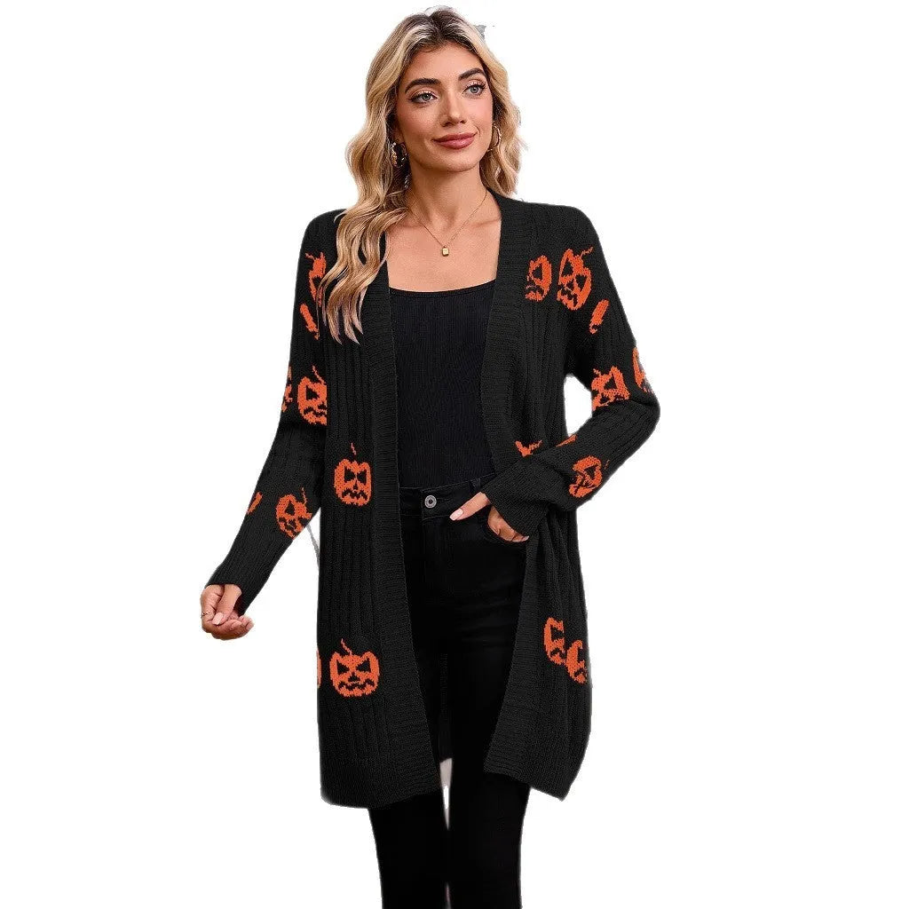Women's black Halloween cardigan with orange Jacquard knitted pumpkin head pattern, shown as an open medium-length knit.