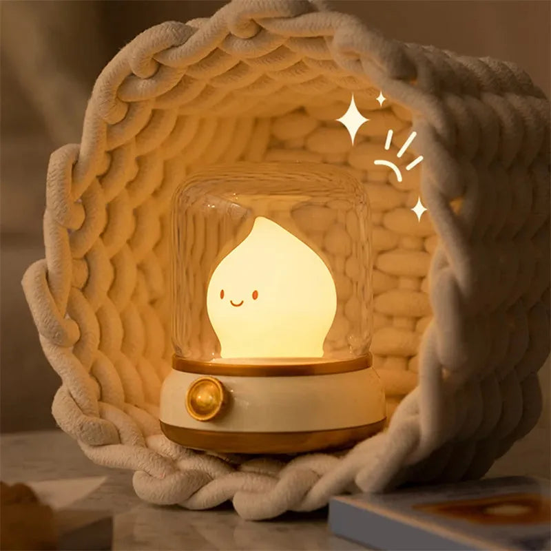 Green retro oil lamp design USB rechargeable LED desk night light on a wooden table.