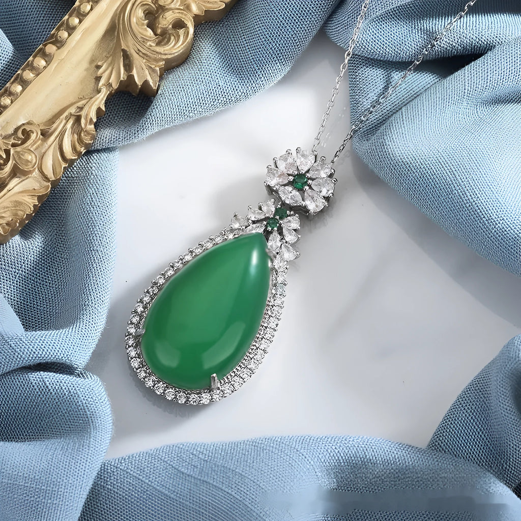 Green chalcedony water drop pendant with geometric ellipse shape and electroplated copper setting