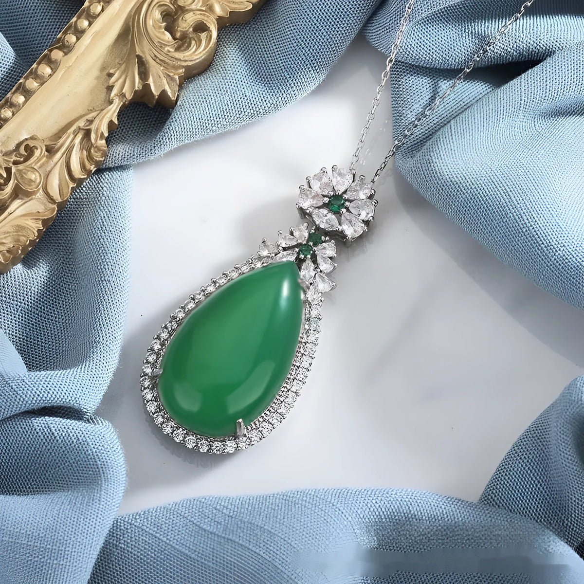 Green chalcedony water drop pendant with geometric ellipse shape and electroplated copper setting
