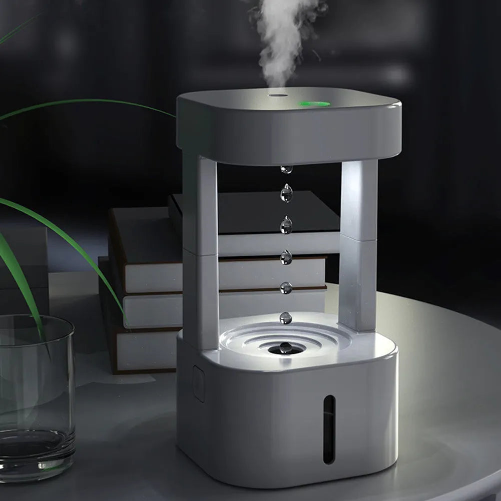 Creative anti-gravity water drop humidifier with optical water droplet illusion and colour lighting