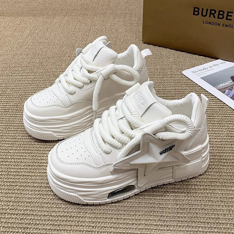Women's casual platform board shoes in white with low heel, lace-up closure, and rubber sole