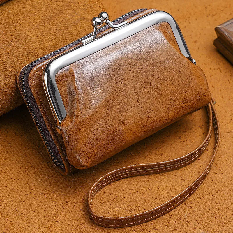 Ladies' black leather buckle coin purse with a 4-inch silver metal clip attached to a keyring.