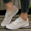 Women's creamy white casual sneakers with soft fabric upper and rubber sole