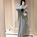 Women's grey knitted cardigan dress and matching coat set on a hanger.