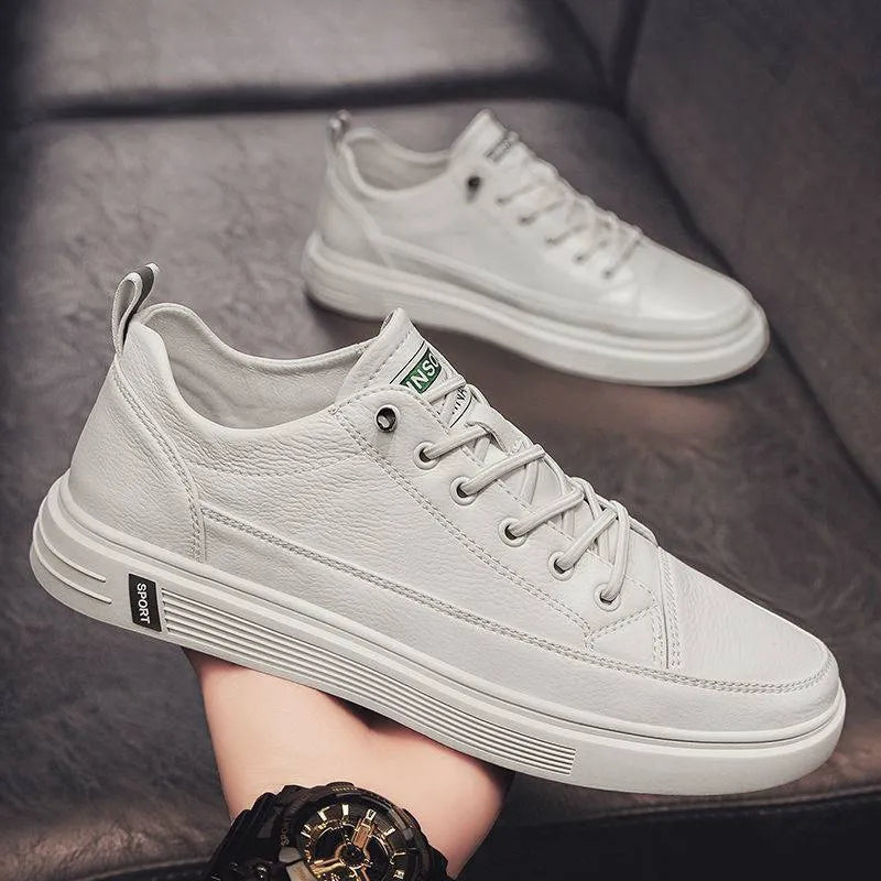 Men's white casual shoes with round toe, low heel, and shallow opening in Korean style