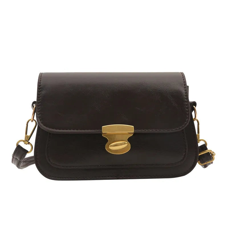 Soft PU leather small square handbag in horizontal rectangular shape showing black colour option