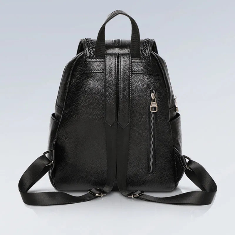 Solid colour genuine leather women's backpack with front sandwich pocket in blue.