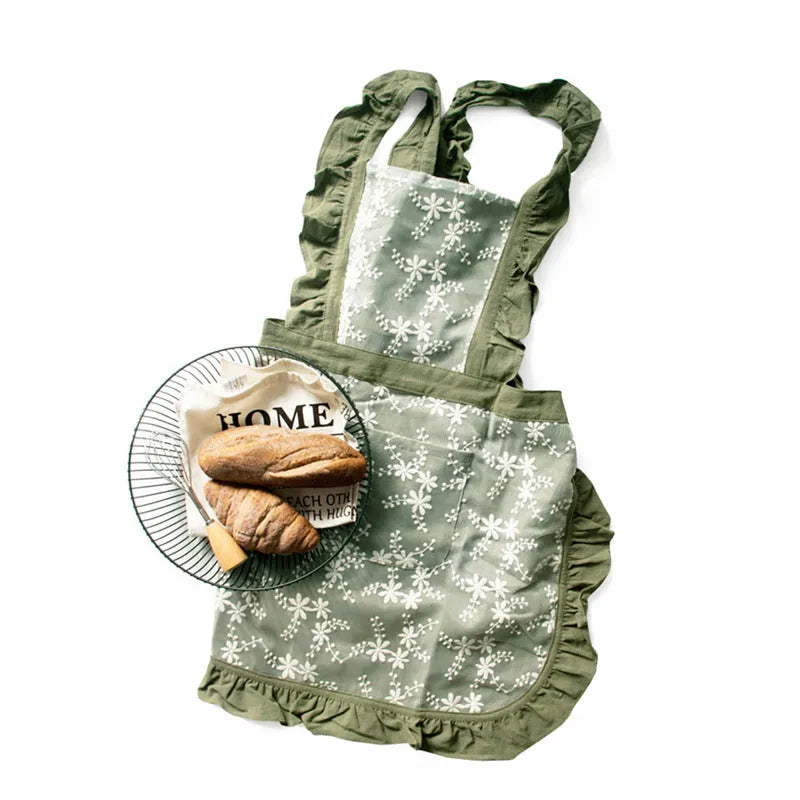 Minimalist cotton linen apron with X-strap design and lace details in light pink colour