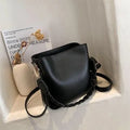 Retro khaki PU leather crossbody bucket bag with woven detail and a brown strap.