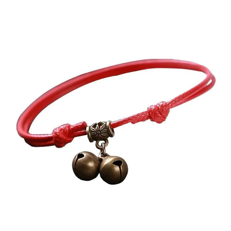 Adjustable nylon dog collar with brass buckle and bell in black, red, or coffee colours