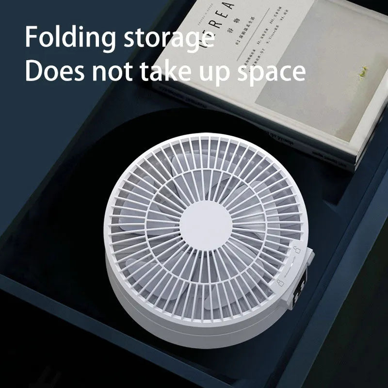 White portable folding fan with remote control and warm night light on desktop