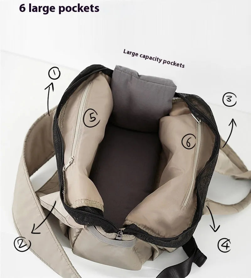 Apricot cloth pet carrier handbag for small dogs or cats, showing handle and breathable fabric.