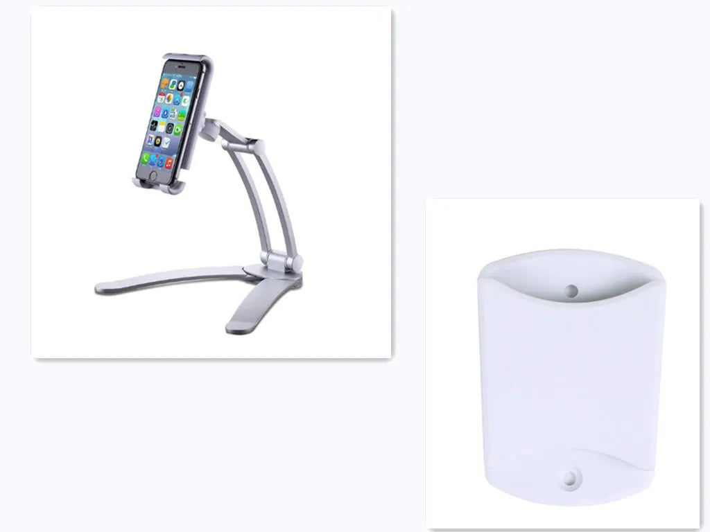 Silver aluminium alloy desktop stand holding a tablet at an angle, with adjustable clips and a white mounting base.