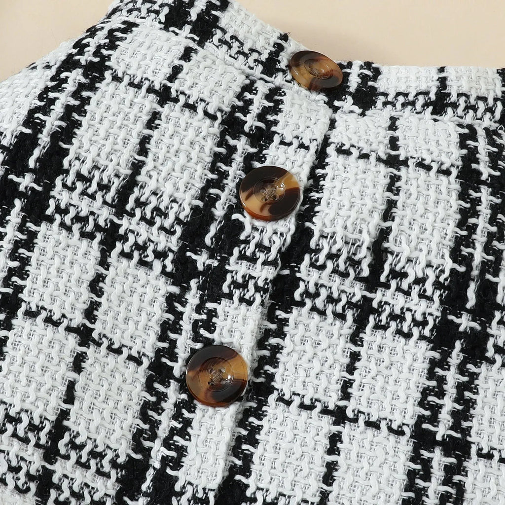 Babies' short-sleeved blouse skirt suit in black with plaid pattern, including romper, skirt and hairband