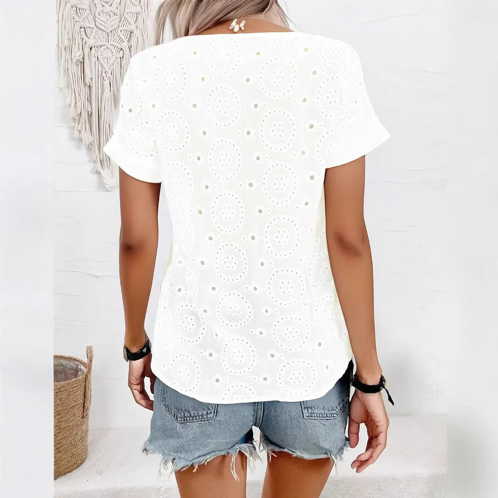 White women's V-neck loose t-shirt with hollow short sleeve design.