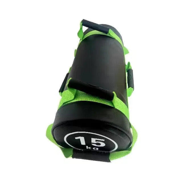 Flat white leather PVC fitness training sandbag for weight lifting on a gym floor.