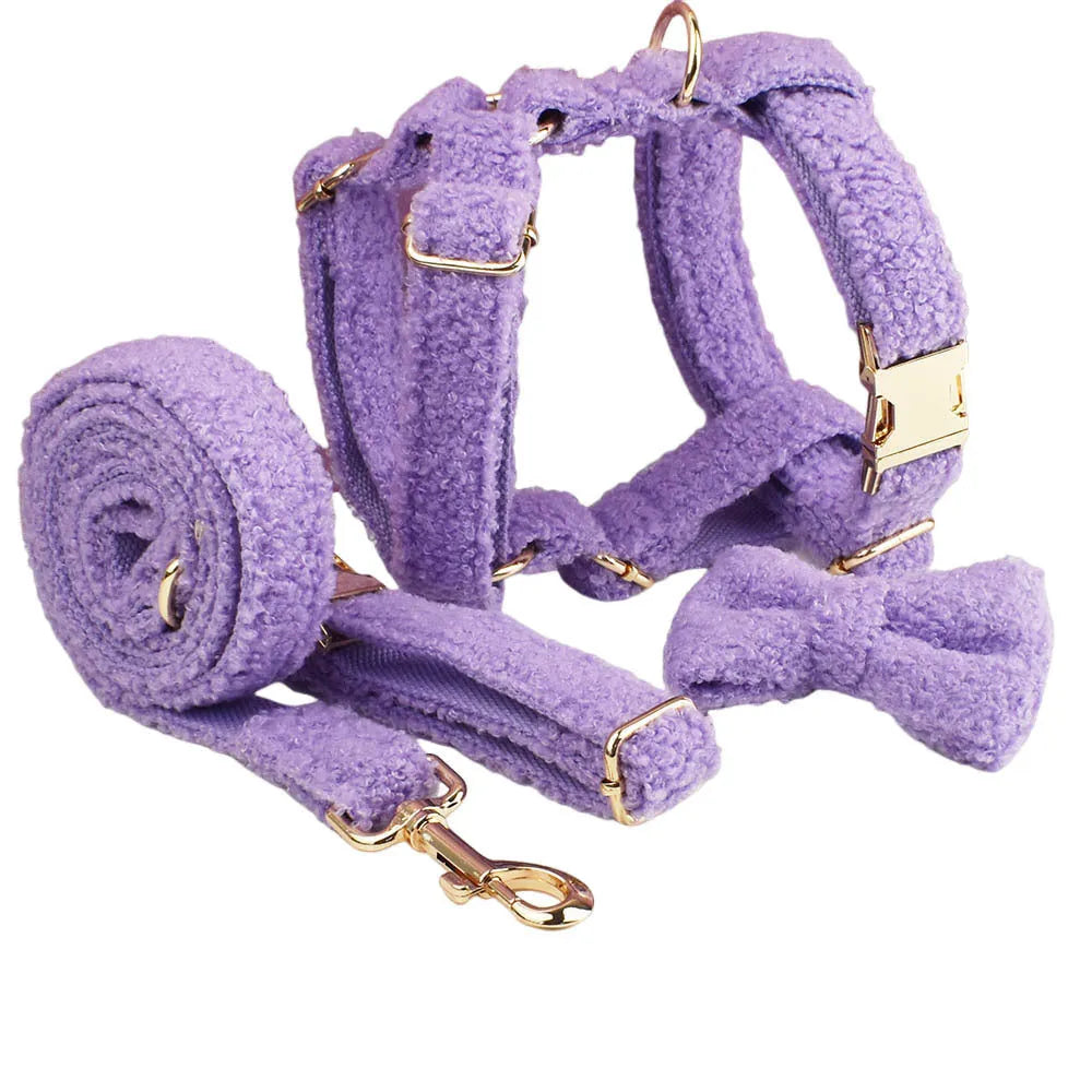 Purple cloth dog collar and leash set with matching vest and bow accessory for small breed dogs