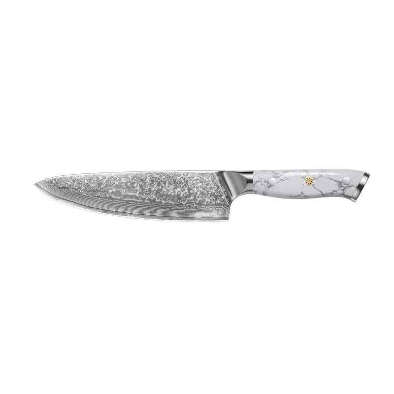 Damascus pattern chef's knife with 32cm total length on kitchen counter