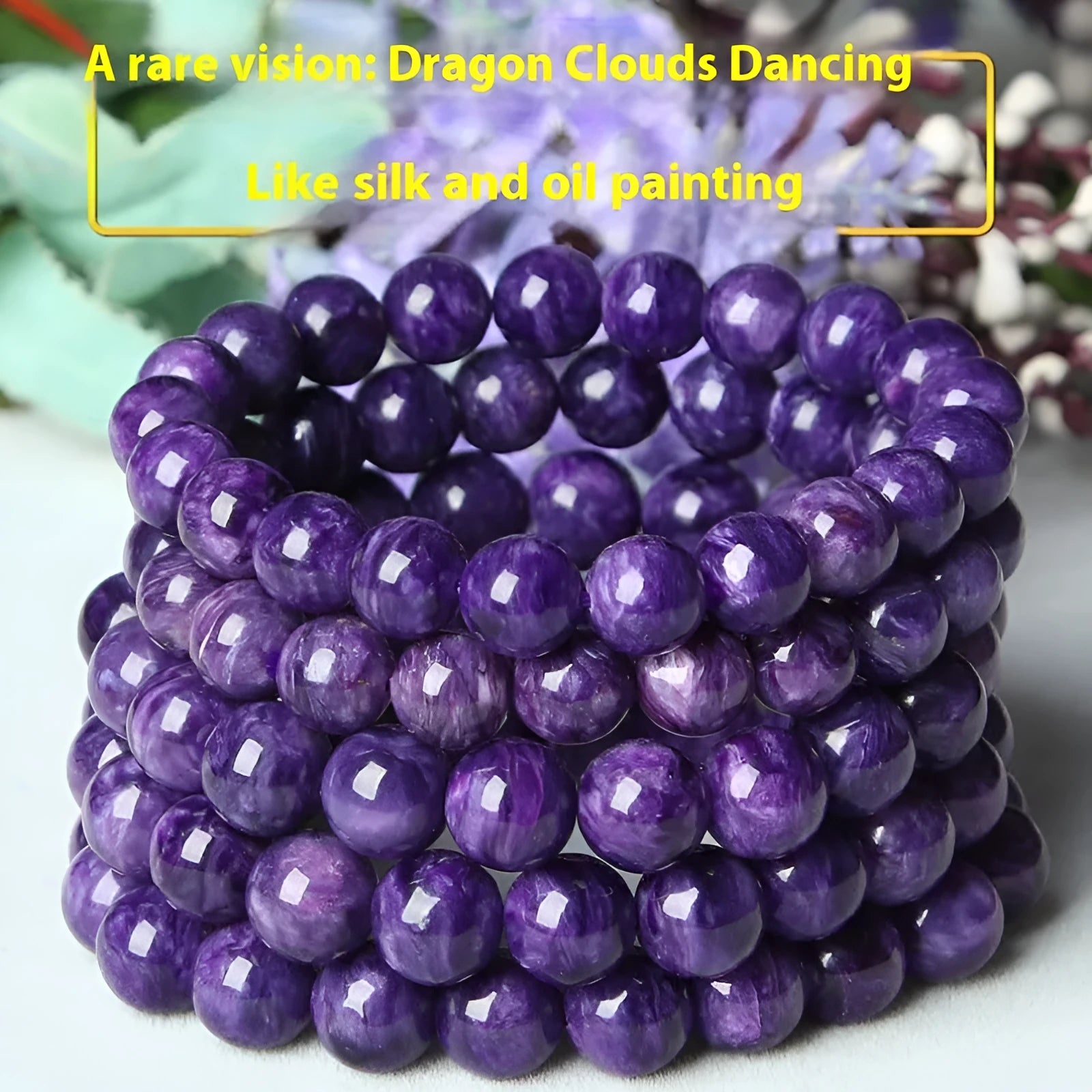 Natural purple charoite crystal bead bracelet on wrist with platinum plated silver clasp.