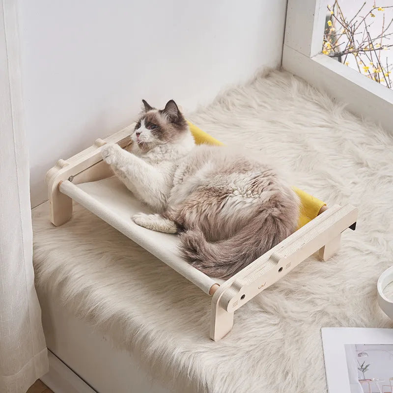 Solid wood cat bed with a removable fabric cover, shown in a grey colour option.
