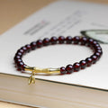 Natural garnet stone set in a 6mm bamboo joint ring bracelet with copper or silver finish.