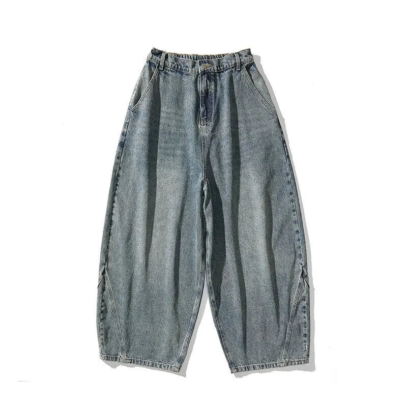 Men's plus size light blue wide leg baggy jeans on a hanger