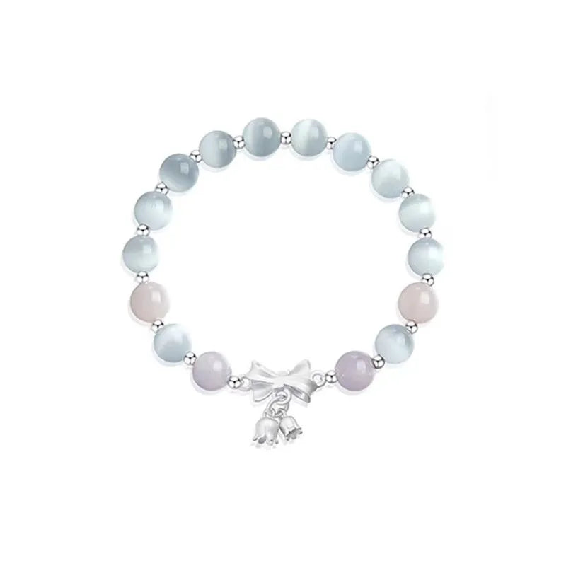 Lavender purple bowknot crystal bracelet with opal elements measuring 10mm