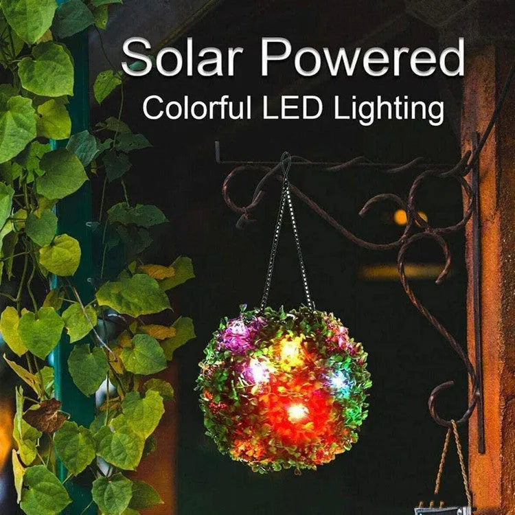 Solar grass ball light with plastic rattan shade, IP55 rated, 20x20x34cm, warm white LED for garden decoration