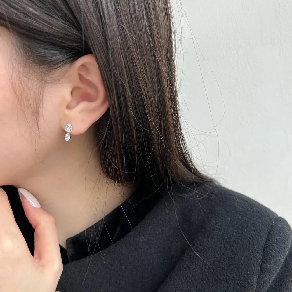 S925 sterling silver stud earrings for women with geometric shape, electroplated finish, and white colour