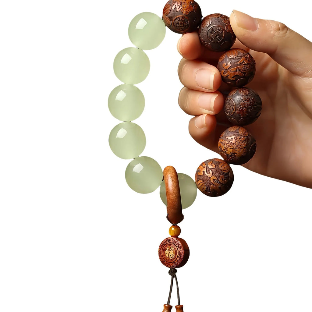 Rosewood bracelet with carved Fu character in amass fortunes colour on flexible 20mm ring
