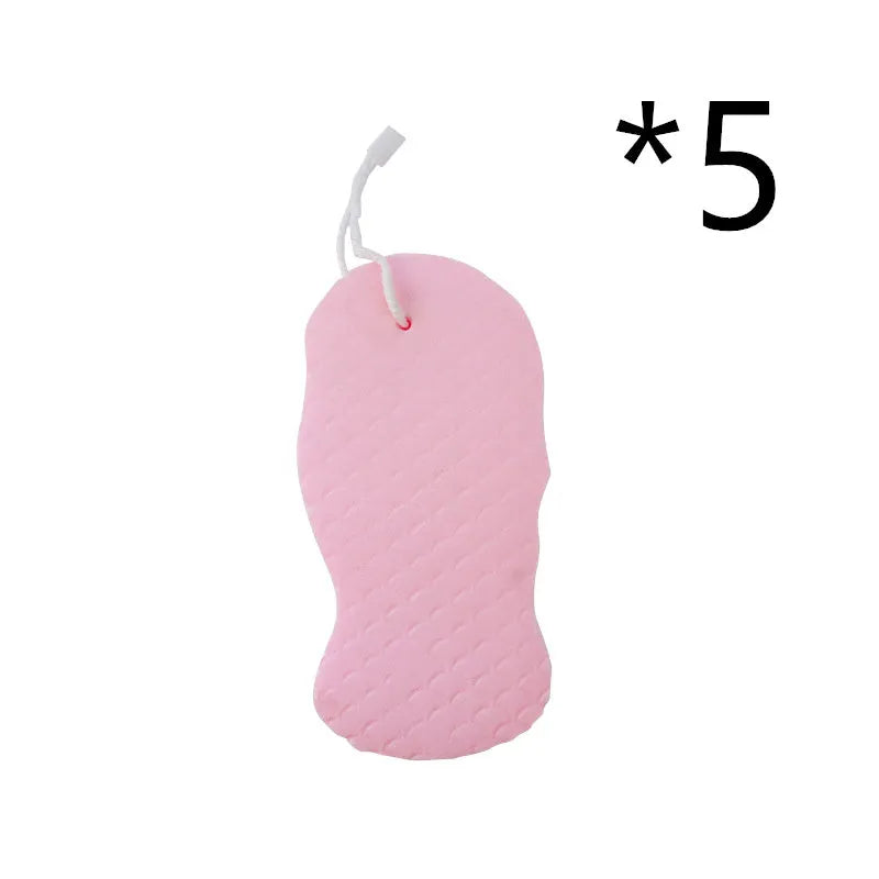 White 3D bath sponge with fish scale pattern for gentle body exfoliation in shower.