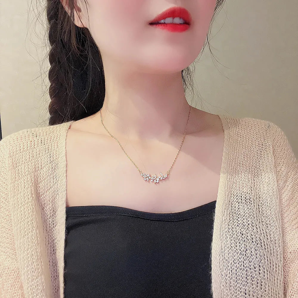 Titanium steel flower pendant necklace with petal zircon and mixed gem inlay, X251 gold, adjustable O-ring chain