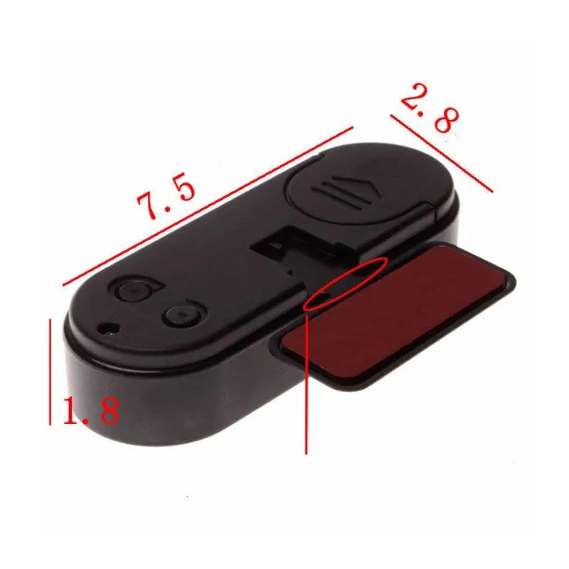 Black electronic car clock and thermometer on an adjustable bracket with luminous LED display.