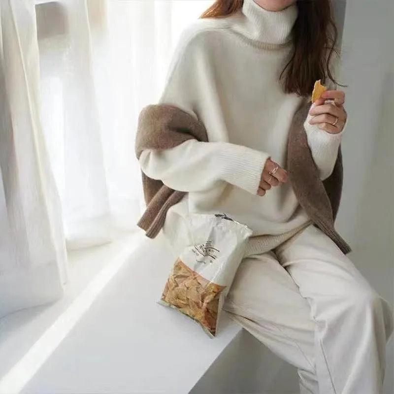 Women's high-neck loose knit pullover sweater in solid colour with long sleeves and one-size fit