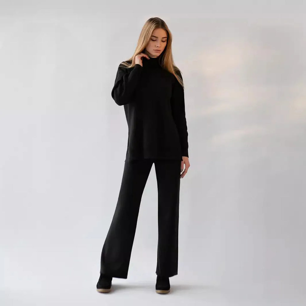 Women's turtleneck knit sweater suit set in solid colour with long sleeves and matching trousers on display