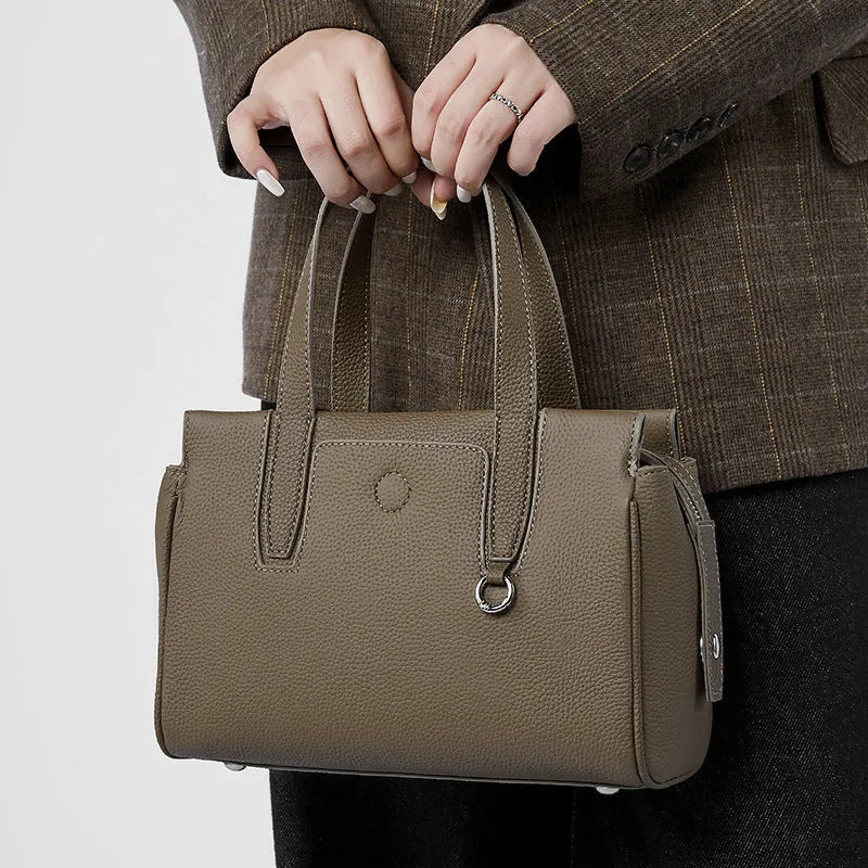 Genuine cowhide leather crossbody bag in horizontal square design with adjustable shoulder strap
