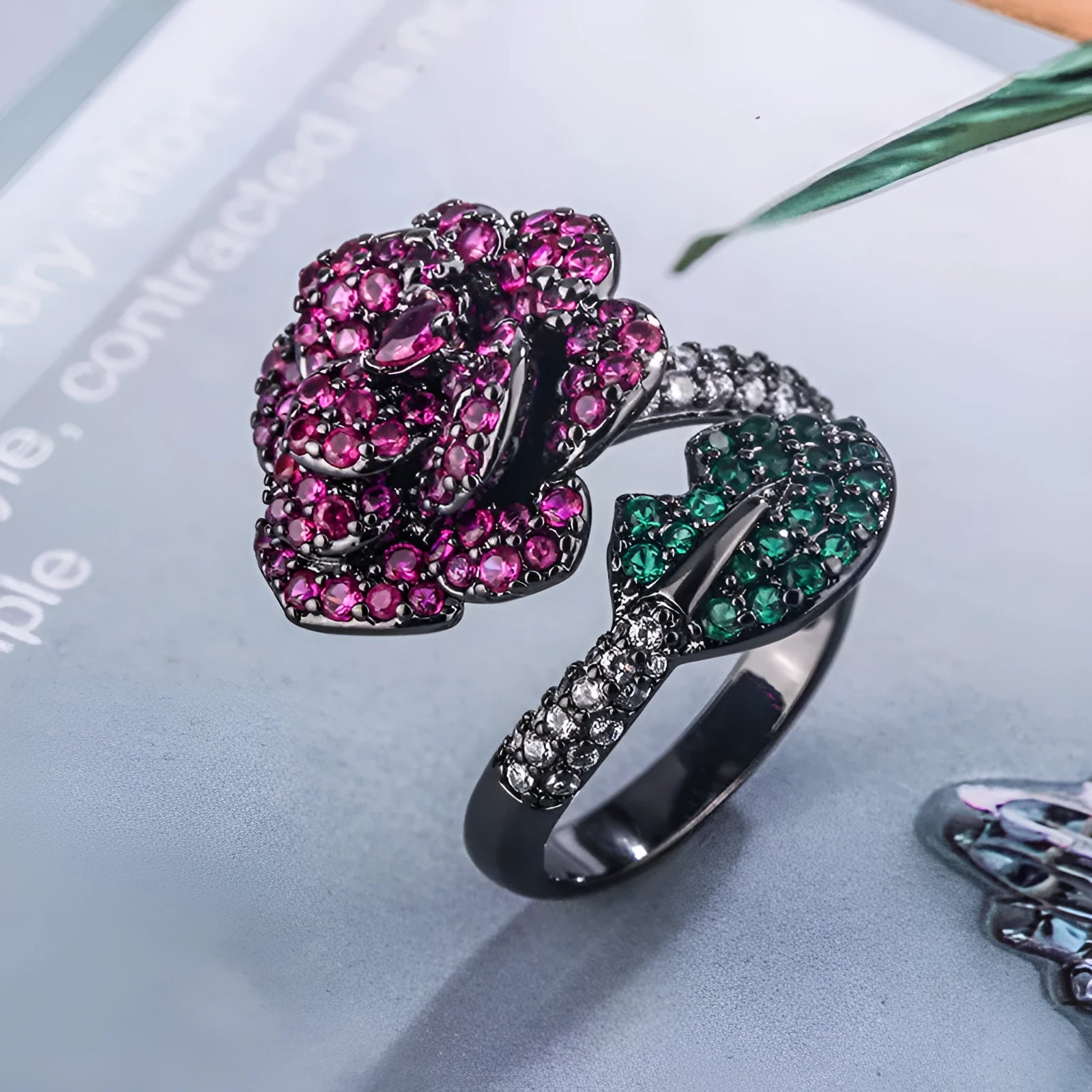 Black gold geometric flower ring with simulated red corundum stones on copper base