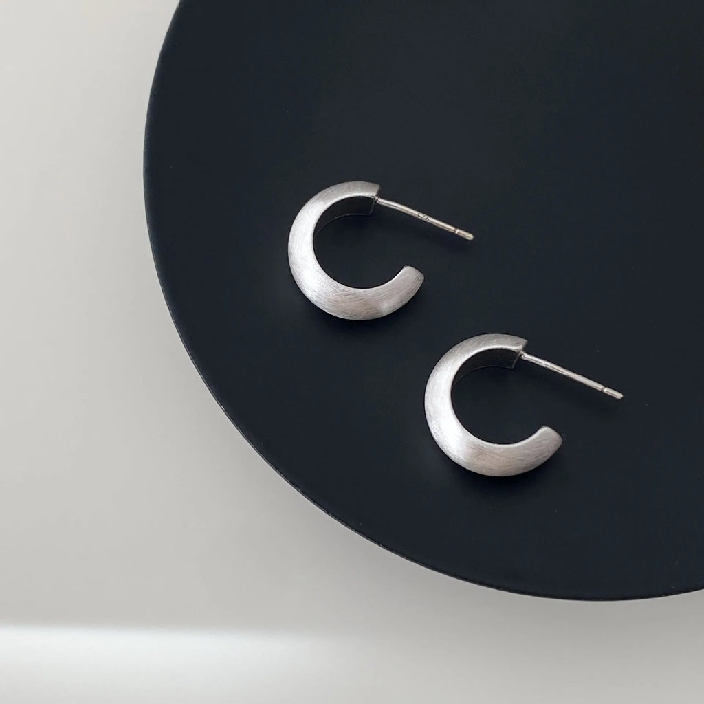 Geometric C-shaped frosted brushed copper earrings in gold as ear clips for women minimalist style