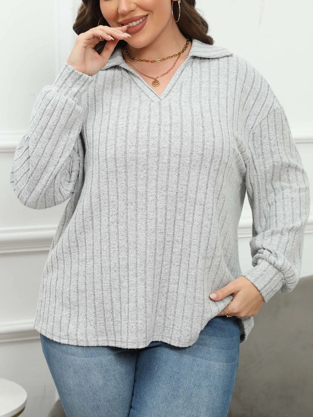 Women's plus size gray fleece pullover with polo collar and lantern sleeves