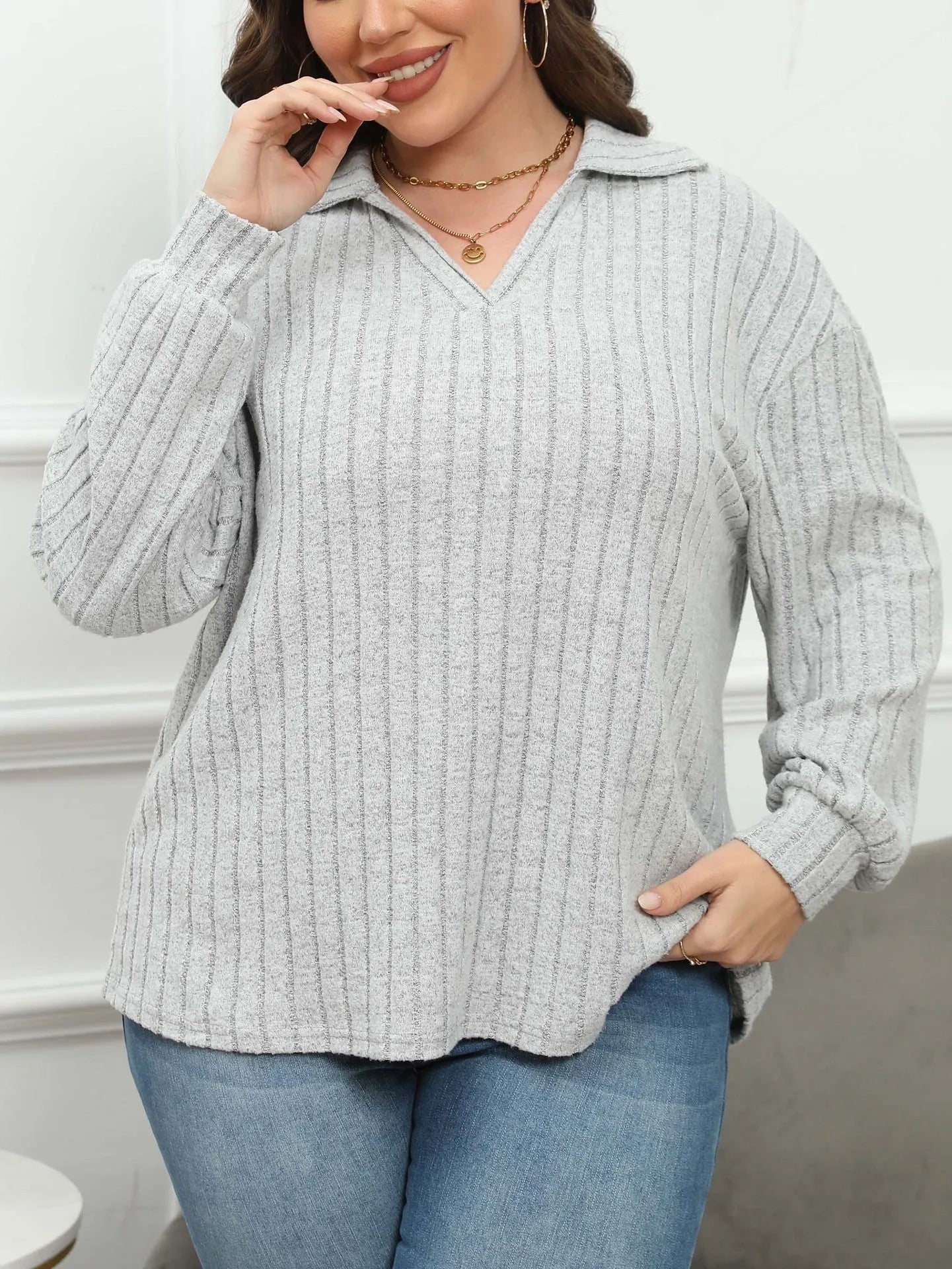 Women's plus size gray fleece pullover with polo collar and lantern sleeves