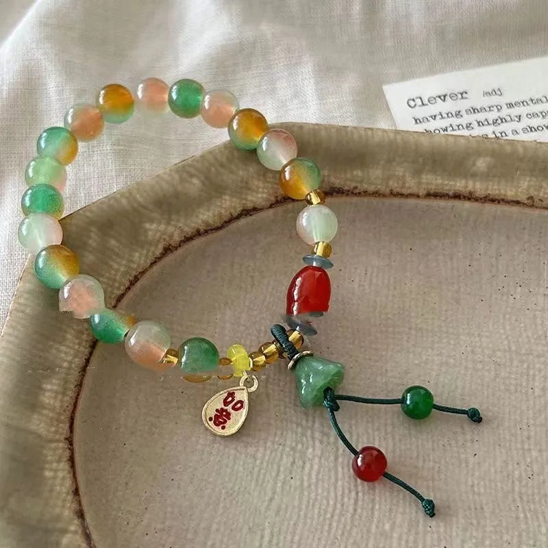 M990 Lotus Ruyi bracelet showing lotus decorative elements and mixed material construction