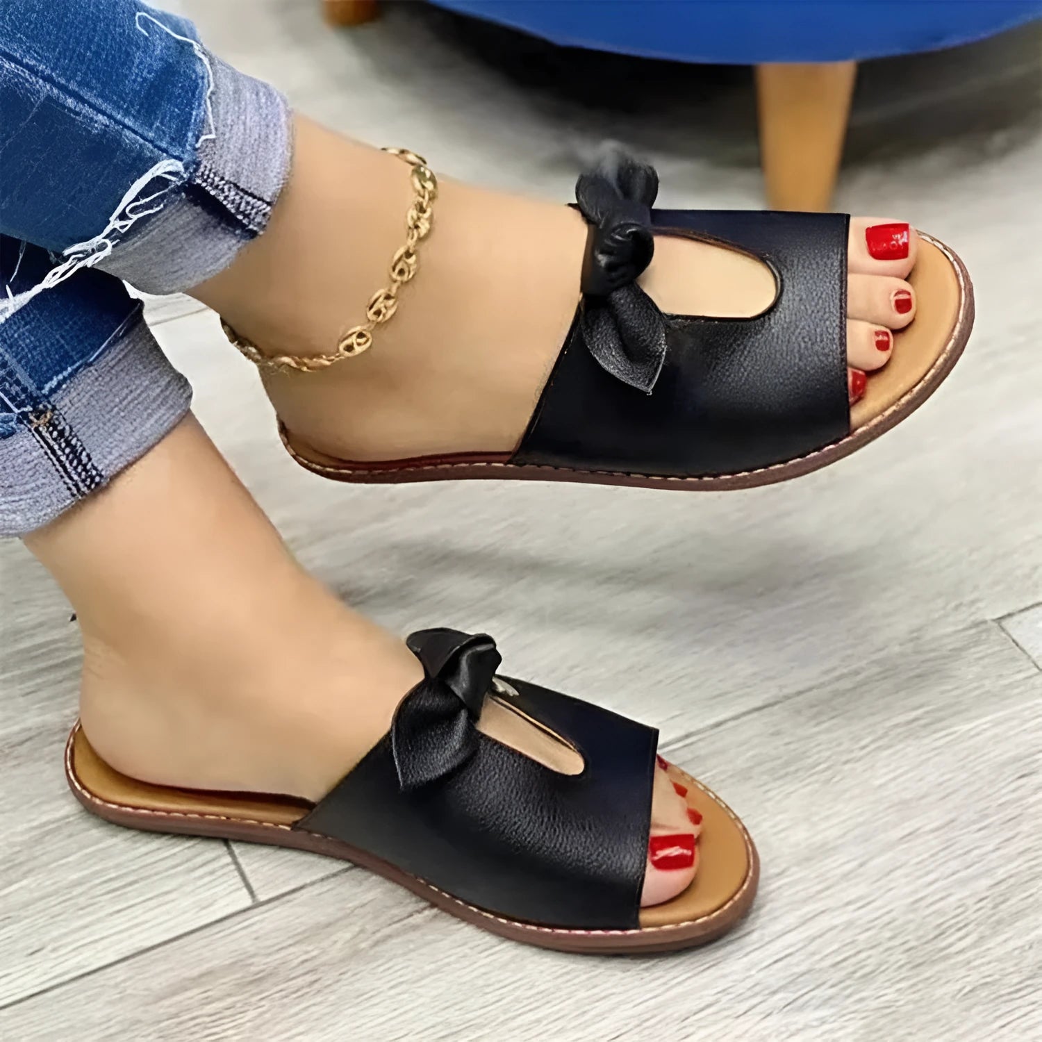 Ladies fish mouth sandals with a decorative bow on the upper, shown in black, pink, and gold colours.