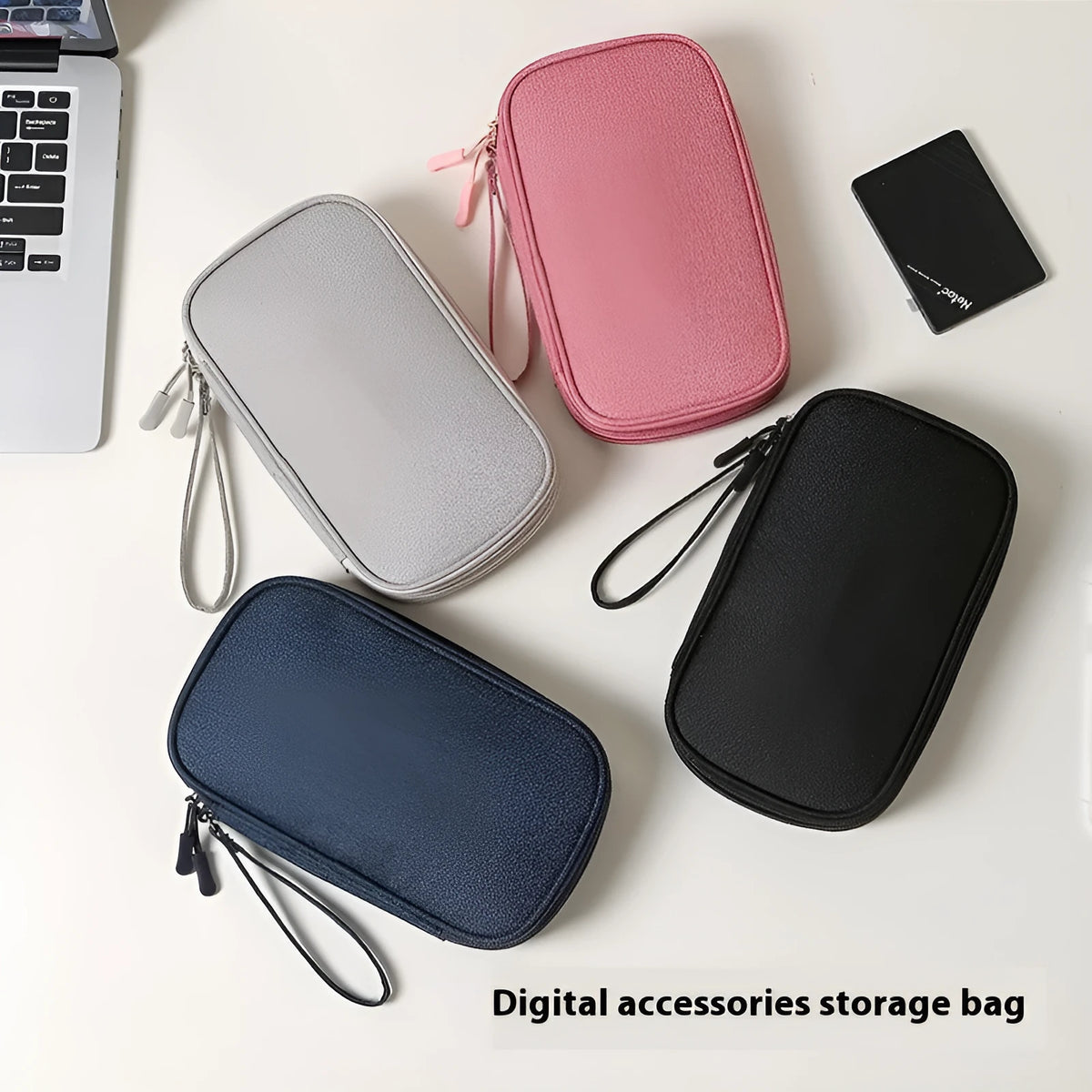 Portable data cable buggy bag in light gray, handbag style, 19x11x3 cm, on flat surface