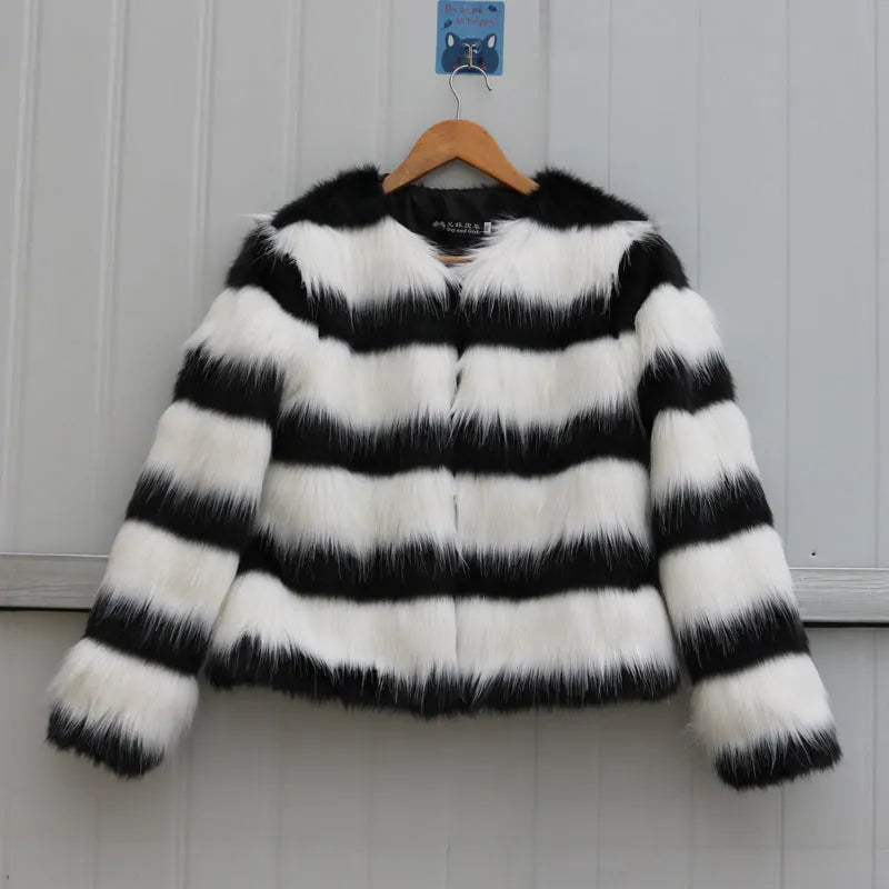 Black and white striped faux fur leather jacket for women, shown in a street fashion style.