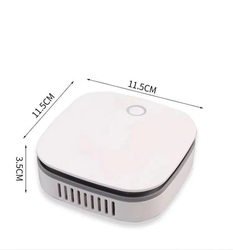 White portable USB air purifier with button control for car and small room use.