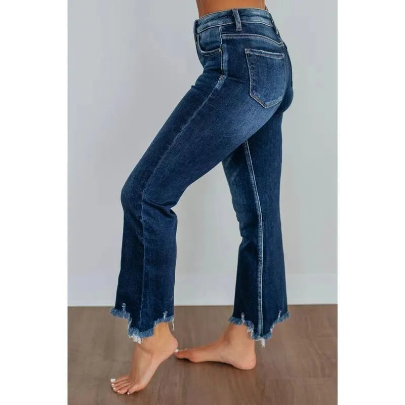 Solid colour women's cotton denim jeans with a hand-worn finish in light blue and dark blue.